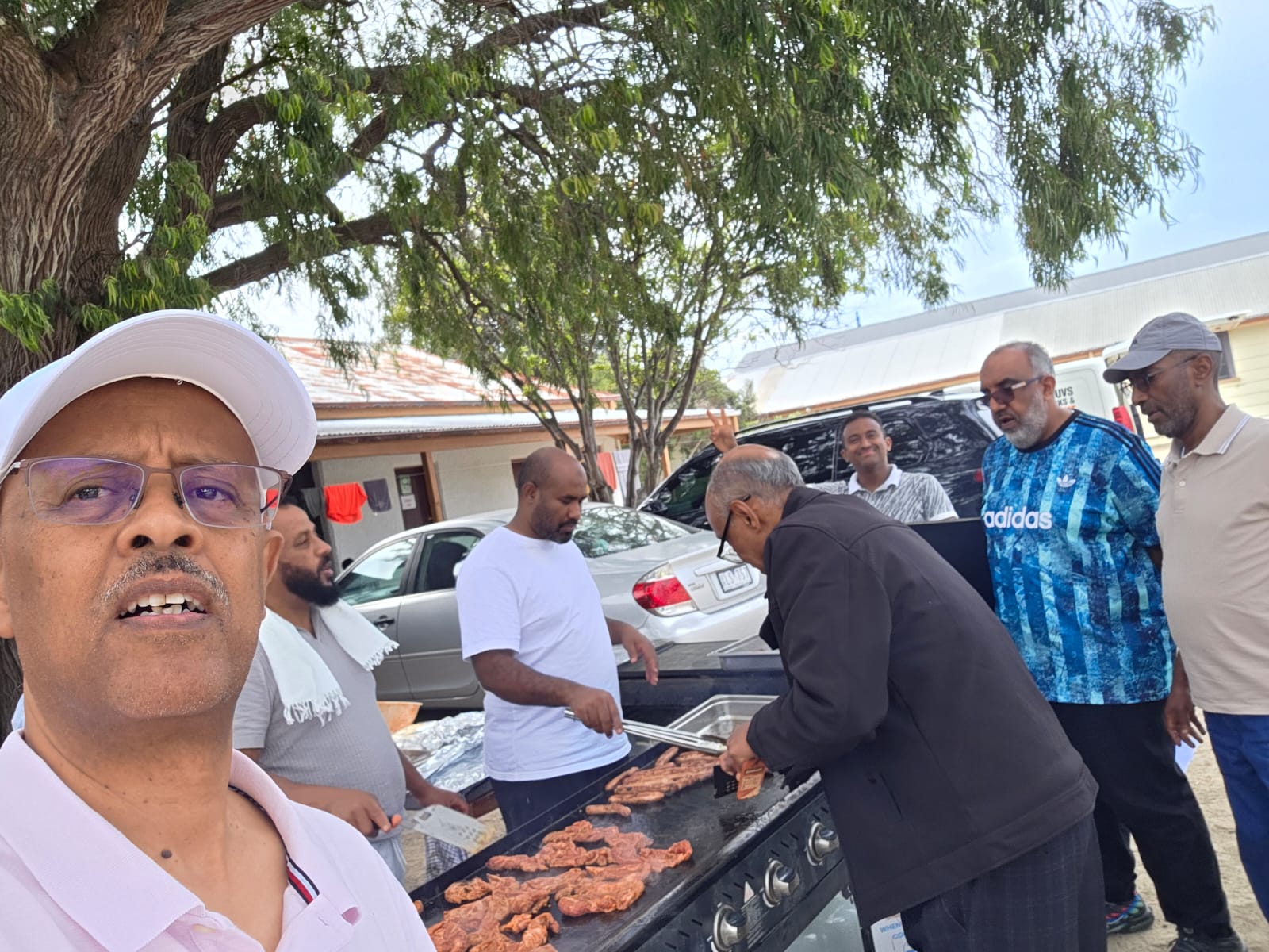 Community BBQ — Sharing a meal, sharing stories.